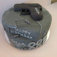 James Bond 007 gun is made out of rrt and fondant.