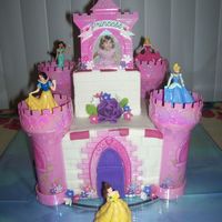 Disney Princess Castle Cake This cake was made with a castle kit that I bought on e-bay. I made the flowers out of cold porcelain that way I could have a keepsake of...