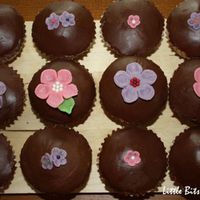 Chocolate Peanut Butter Cupcakes W/ Marzipan Flowers This was my first time working with marzipan and this is what I came up with! The chocolate peanut butter frosting was insanely thick, I...