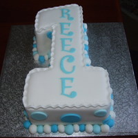 1St Birthday Cake Number 1 shaped cake with fondant Icing balls