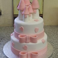 Pink Princess Castle Cake Quick version of a castle cake. With Pink bows and hearts