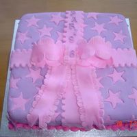 Package Cake Chocolate cake, covered in fondant, for 6th birthday. These are her fav colours.