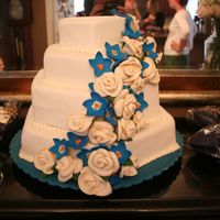 Lisa's Shower Cake My first gumpaste roses and delphiniums. I could not find cutters or tutorials for delphiniums, so I made it up with a star cookie cutter....