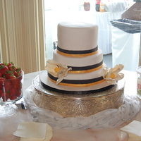 Who Dat Bride Bridal shower cake for a MAJOR Who Dat bride. Top tier is yellow, middle tier is carrot, bottom tier was Chocolate Guiness with Bailey'...