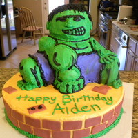 Hulk I saw one of these on CC... I am not very good at carving or piping but the 5 year old liked the cake :)