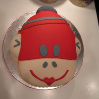 Sock Monkey Baby Shower Cake Sock monkey cake, to match invitation Cake is red velvet with dark chocolate buttercream. Covered in hand rolled fondant