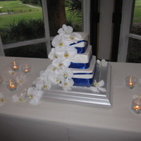 Gran & Jenna's Wedding Jenna & Grant's Wedding! Top tier chocolate Middle tier vanilla bean Bottom tier lemon All topped with vanilla buttercream. Satin...