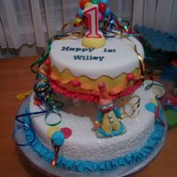 Clown 1St Birthday All hand-made clowns, Had fun making this and was a great hit for the birthday boy.Bottom is fruit cake then chocolate.