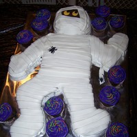 Mummy I have done Mummy cakes before of just the head, but decided to do the whole body this year. Just chocolate cake with MMF and a few...