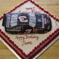 Nascar RaceCake kit (#3) (now SportsCakes) atop a 16" square. Car decorated with kit contents; rest is buttercream.
