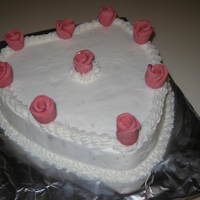 Heart & Roses Here's a cake that I made for a church lunch on valentines. I cant remember what the name of the roses are called at this time -...