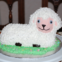 Lamb Fondant face and hooves. Buttercream wool.