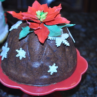 Boiled Sticky Toffee Pudding A very old English Christmas Cake served with toffee sauce and vanilla ice cream. Decorations are out of fondant.