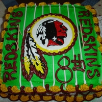 Washington Redskins choc cake, buttercream icing, logo made out of royal icing
