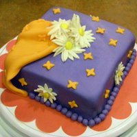 First Gumpaste Use Purple and orange, tried to do a little psychedlic scheme. Gumpaste Course, class 2.