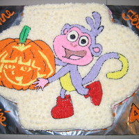 Halloween Birthday Cake My niece requested a Dora and Boots cake for her Halloween birthday, so I came up with this. All buttercream.