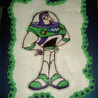 Buzz Lightyear My first cake! A cupcake cake iced with buttercream and smoothed with a Viva papertowel. I did a frozen buttercream transfer for Buzz...