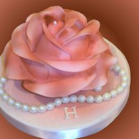 Victorian Rose Inside this rose is a round cake about the size of a medium cupcake. The cake is split in two with raspberry/buttercream filling in the...