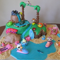 Beach Fun Island Beach Fun cake I made for my daughter's 6th b-day. All of the LPS animals are not edible, except for the alligator, turtle,...