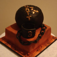 Ball And Chain Anniversary Cake This was fun. Never done a round cake before but it turned out great thanks to the Wilton ball mould. This was an anniversary cake for...