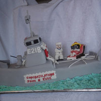 Engagement Navy Ship This was alot of fun to do. The groom is in the NZ navy and his fiance is a book editor, hence she is reading a book.