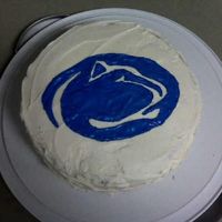 Penn State Cake Orange cake, cream cheese icing. Used printed photo, wax paper, piping gel, and color flow to make the design.