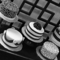 Black And White Table Cakes These cakes were done as a donation for the Ronald McDonald House Gala. Each cake was the centerpiece/dessert cake for the tables. All done...