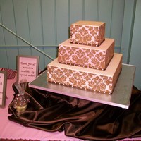 Pink And Brown Damask This is the first cake I've ever stenciled. I used it for a display cake at a craft show. Pink MMF and brown royal icing for the...