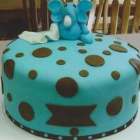 Baby Shower Cake I made this cake for my daughter-in-laws baby shower, the elephant is holding a bottle with his trunk and blanket draped across his leg....