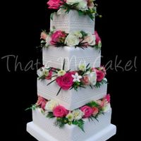 White Wedding Cake The brides only request was she wanted her cake to be BIG! She sure got that.. The 4 tiers were 4"' in height, the bottom tier...