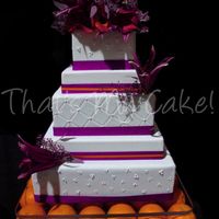 Purple & Orange Wedding Cake Purple and Orange are soo popular here right now..