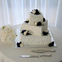 Moore-King Wedding Cake My first square wedding cake. Three tier, 14", 10" 6" in vanilla butter with semi-sweet chocolate ganache for top and bottom...