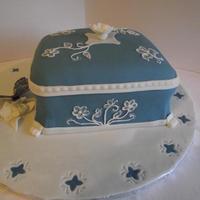 Wedgewood Box Cake Fondant Wedgewood look with Brushed Embroidery and gumpaste accents, edible butterfly with gumpaste blossoms.