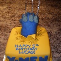 Wolverine! I was asked to make a Wolverine cake ... so I did! The client didn't have any input other than "make a Wolverine cake" so...