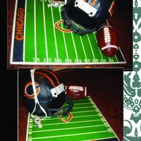 Bears Helmet Board is made out of fondant to look like a football field. Football is made from rice krispie treats, whistle is made from fondant!