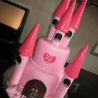 Princess Castle Cake two layer princess castle cake, all edible except the tower portion. The top ower was edible, make w ith fondant and ice cream sugar cone &...