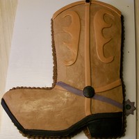 Cowboy Boot half sheet sized cowboy boot, iced in chocolate buttercream with mmf accents.