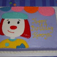 Birthday Circus Free-hand cartoon character; buttercream for most--with Frosting Doodle for the red hair and clown nose.