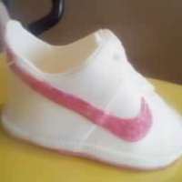 My Verison Of The Gumpaste Nike I got this idea from another caker on CC named kam-ary. I loved it so much i had to try one. So I made my own template and tried it. All...