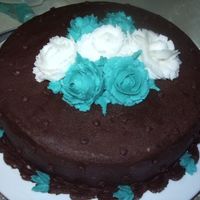 Chocolate, Turqoise And White I made this for my final cake for my first wilton course. My husband picked out the colors and I thought they worked really well together