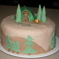 Camping This is a yellow cake with strawberry filling, covered in fondant. It was made for my husbands co-worker. I got the idea of the tent and...