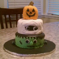 Halloween Cake I took the idea from all of the wonderful cakes here on CC. It was easy and alot of fun to make. Good luck to everyone for this spooky cake...