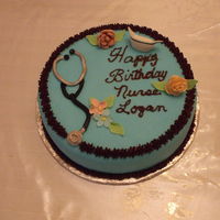 Nurse Birthday chocolate fudge cake . Decorations are fondant andchocolate buttercream.