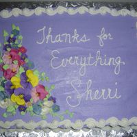 Floral Design Buttercream frostingwith royal flowers; reverse scroll and shell borders in buttercream