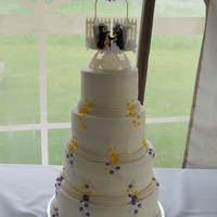 Wedding Cake This was my first wedding cake. It was covered in buttercream and then had fondant decorations. I was pretty happy with how it turned out,...