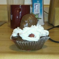 Chocolate Covered Strawberry Cupcake Chocolate fudge cupcake, with fresh stawberry filling on top and a chantilly, whipped icing, topped off with a chocolate covered strawberry...