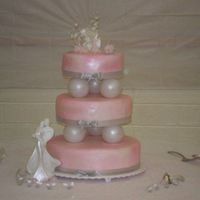 My Wedding Cake This was my first shot at fondant. I was in way over my head the night before my wedding!!!