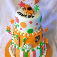 Ashley's Sweet 16 Sweet 16 cake. 3-tier, Orange, lime green, hot pink.Second tier has various street signs on it.