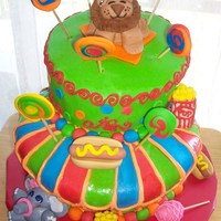 Circus Big Top Topsy-Turvy Circus Cake. Covered in MMF. Animals and decorations are MMF and Gumpaste.