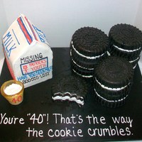 Oreos And Milk Oreo cookies are 6" round chololate cake. Milk carton is vanilla cake. Both are covered in MMF with royal icing details. Glass is...